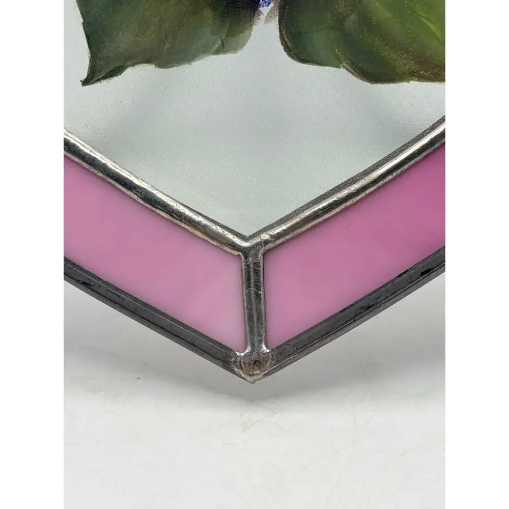 Stained glass heart. With a hand painted floral design.